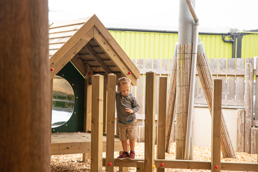 Little Boy Playing on Post Weave