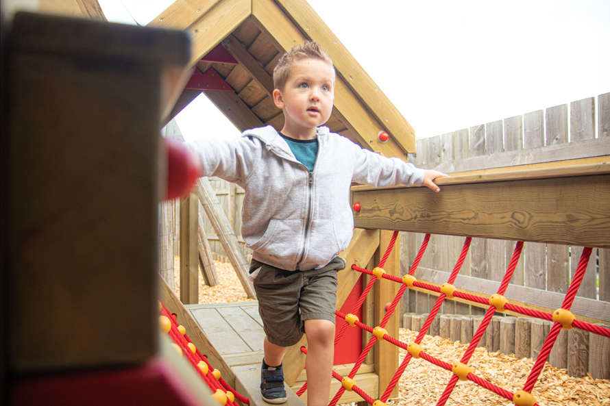 Little Boy Playing on V-Net Bridge