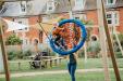 Boy on Birds Nest Swing