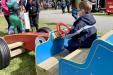 Children Playing on a Play Race Car