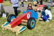 Children Playing on a Play Race Car