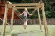 Litttle Girl Swinging on Snake Rope Swing